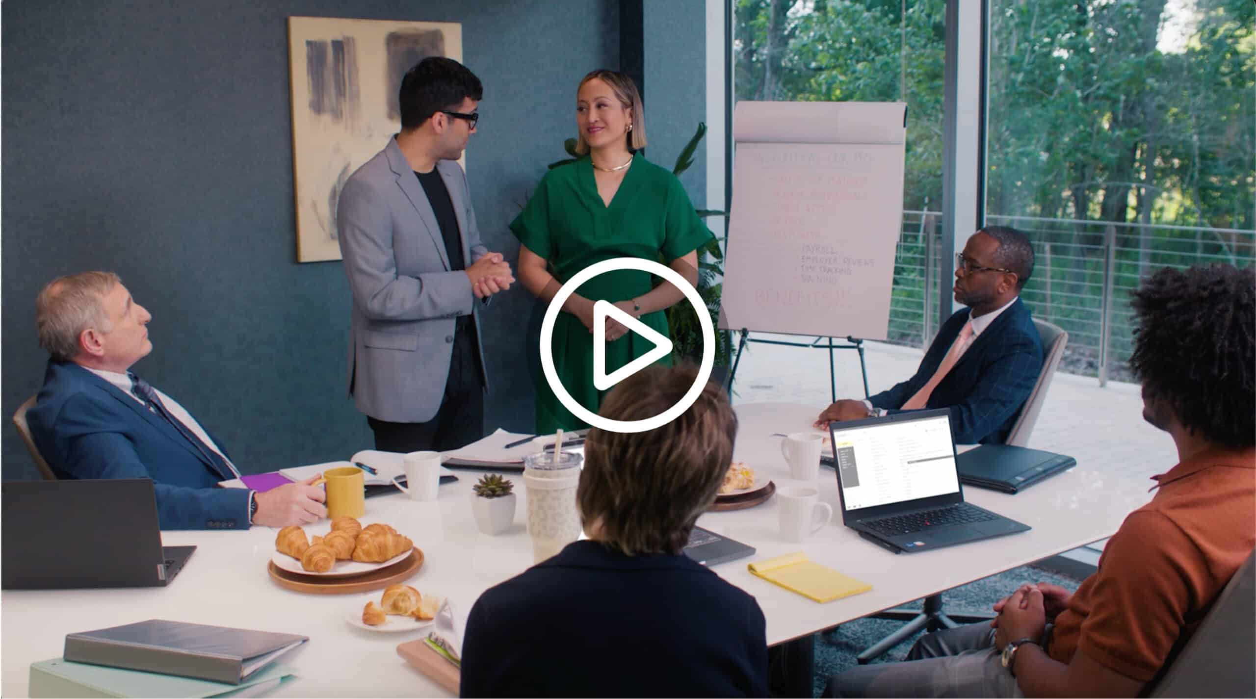 a group of people in a conference meeting