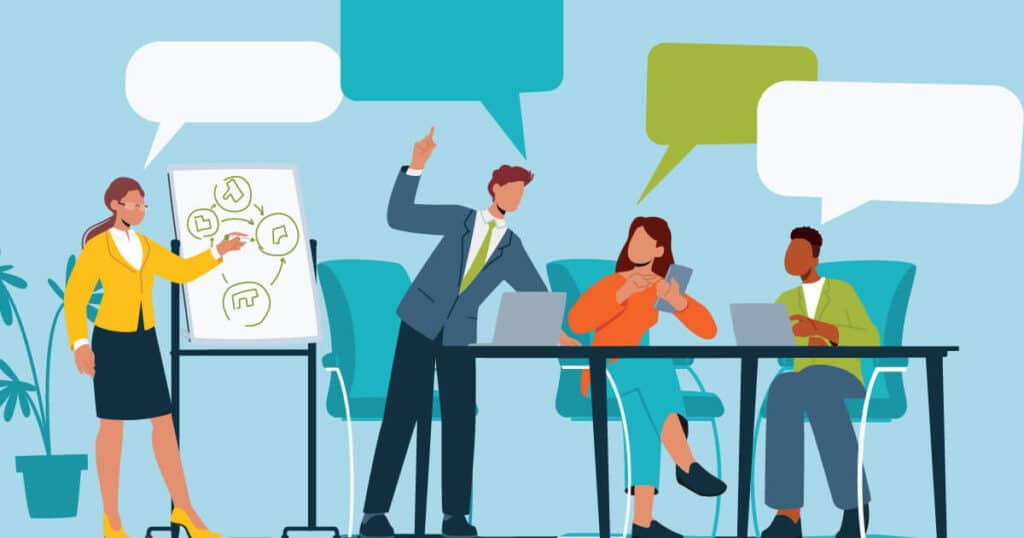 Illustration of four diverse people in a business meeting. A woman presents a flowchart on a whiteboard, while a man gestures, and two others sit at a table with laptops and a tablet, all with empty speech bubbles above them, signifying discussion.