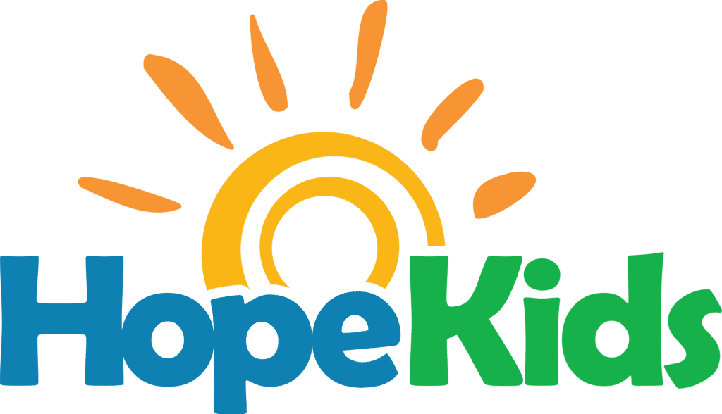 HopeKids logo with a yellow and orange sun above blue 'Hope' and green 'Kids' text on a black background.
