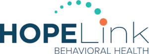 HOPELink Behavioral Health logo. 'HOPE' in bold dark teal, 'Link' in thinner dark teal with an orange dot on the 'i'. An arc of teal dots is above 'Link'. 'BEHAVIORAL HEALTH' is below in smaller text.