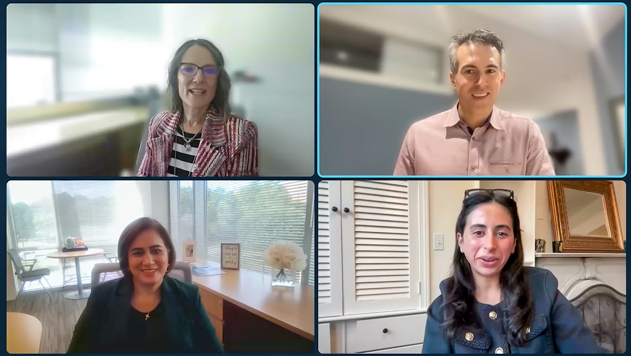 A video conference call showing four smiling professionals in a 2x2 grid, each in a different indoor setting.